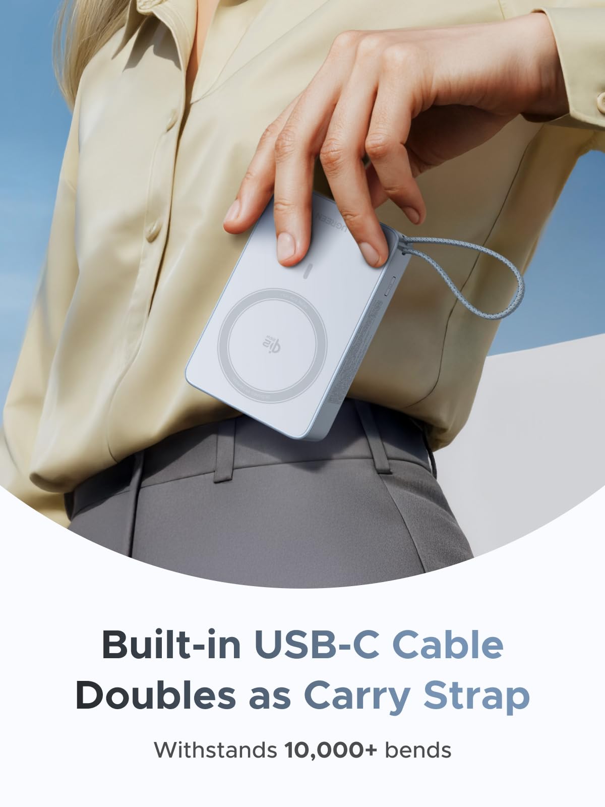 UGREEN Powerbank mit integriertem USB-C-Kabel, das auch als Trageschlaufe dient und über 10.000 Biegungen standhält.