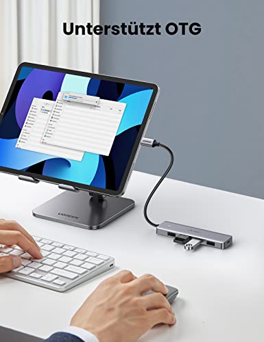 Der UGREEN USB-C Hub (4-Port, USB 3.0, OTG) fungiert als flexibele dockingstation mit OTG-Unterstützung, sodass Smartphones und Tablets direkt USB-Geräte wie U-Disks oder Tastaturen anschließen können.