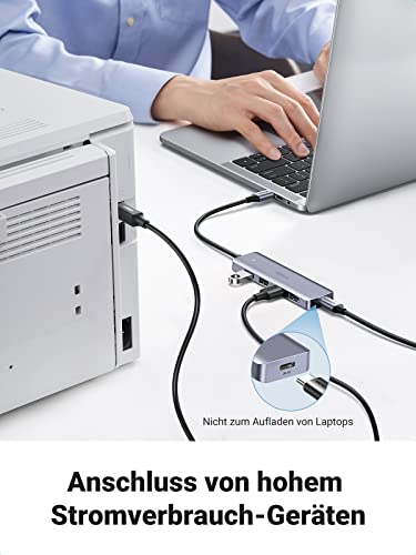 Der UGREEN USB-C Hub (4-Port, USB 3.0, OTG) dient als dockingstation für periphere Geräte mit höherem Stromverbrauch wie Drucker oder Scanner und ermöglicht eine stabile Verbindung zum Laptop.