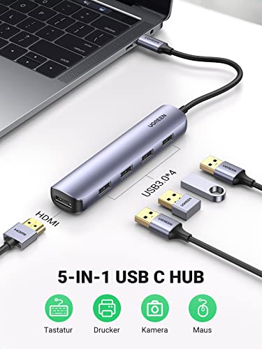 UGREEN USB-C Hub (4K@30Hz, 5Gbps, 5-in-1) erweitert als docking station Ihren Laptop um vier USB-3.0-Ports und einen HDMI-Anschluss für den Anschluss von Tastaturen, Druckern, Kameras und externen Monitoren.